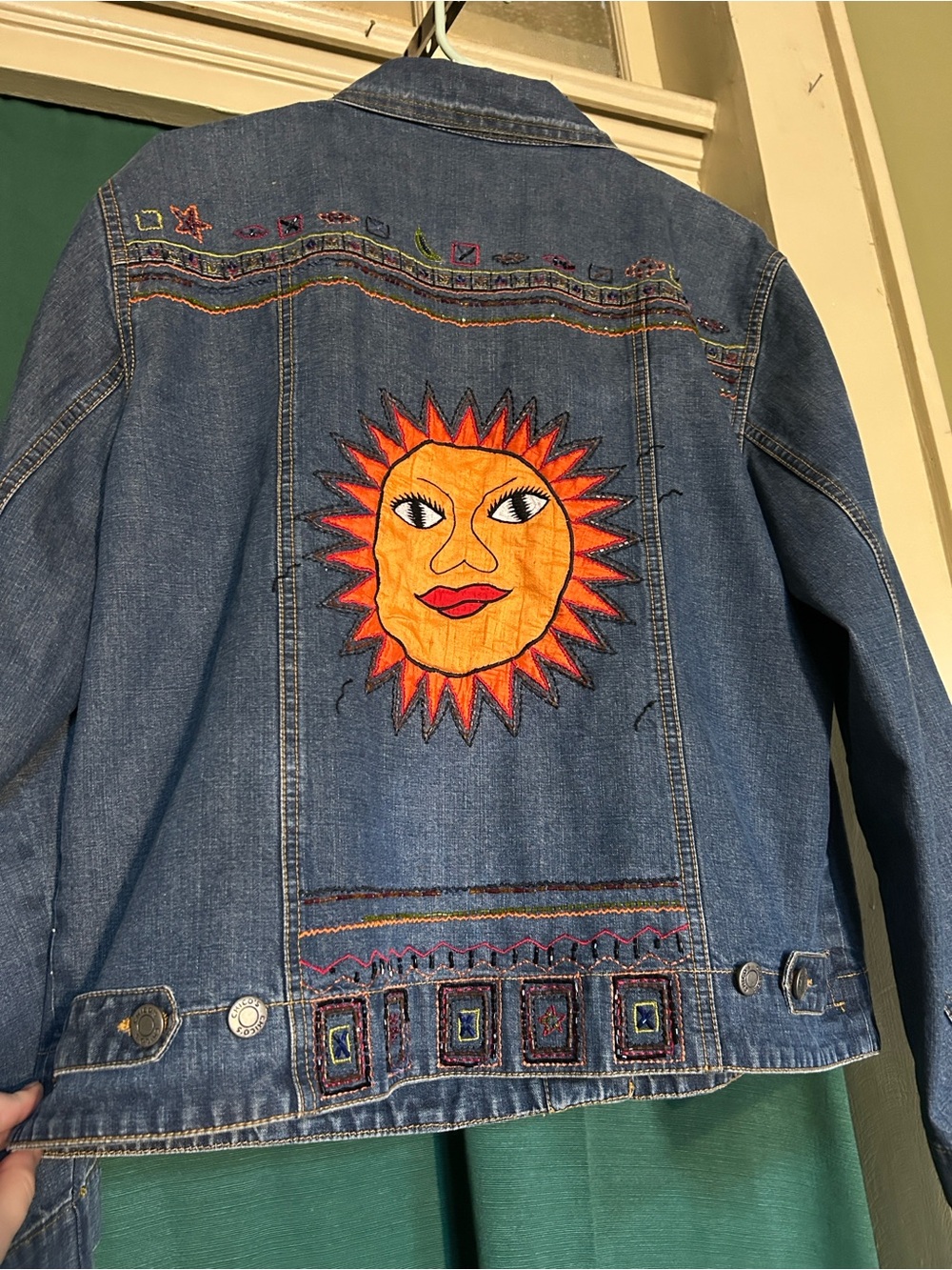 Chico's Denim Jacket with Vibrant Orange Sun Motif